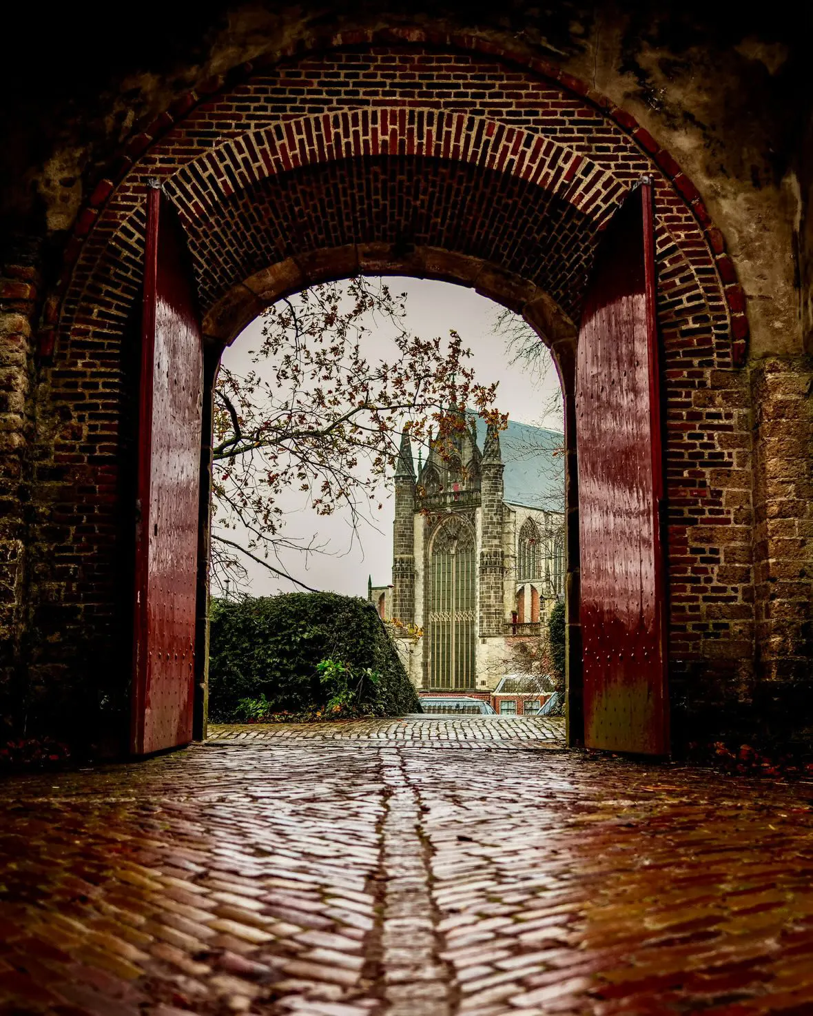 View through the gate of De Burcht towards the Hooglandse Kerk in Leiden